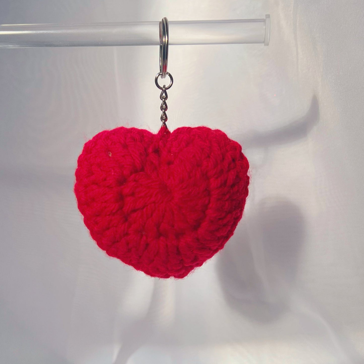 crochet heart keychains pink white ivory red crochet accessories handmade sincerely herrera located in chicago IL cute accessories for bags and keys cute gift ideas valentines day accessories pearl hearts crochet pattern