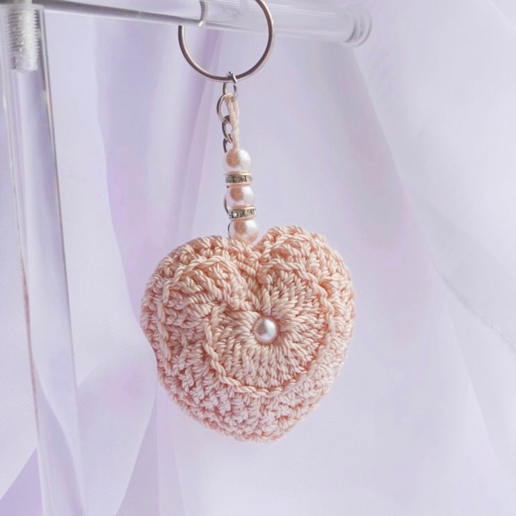 crochet heart keychains pink white ivory red crochet accessories handmade sincerely herrera located in chicago IL cute accessories for bags and keys cute gift ideas valentines day accessories pearl hearts crochet pattern