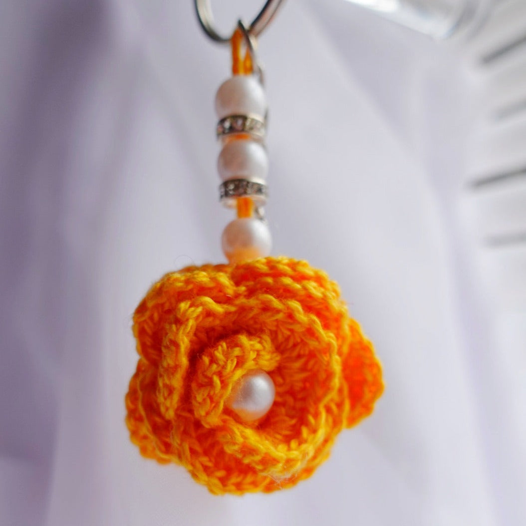 handmade mini crochet flower keychains cute accessories gift ideas eternal flowers handmade sincerely herrera pink yellow blue orange roses coral baby blue purple flower keychains handmade in chicago il