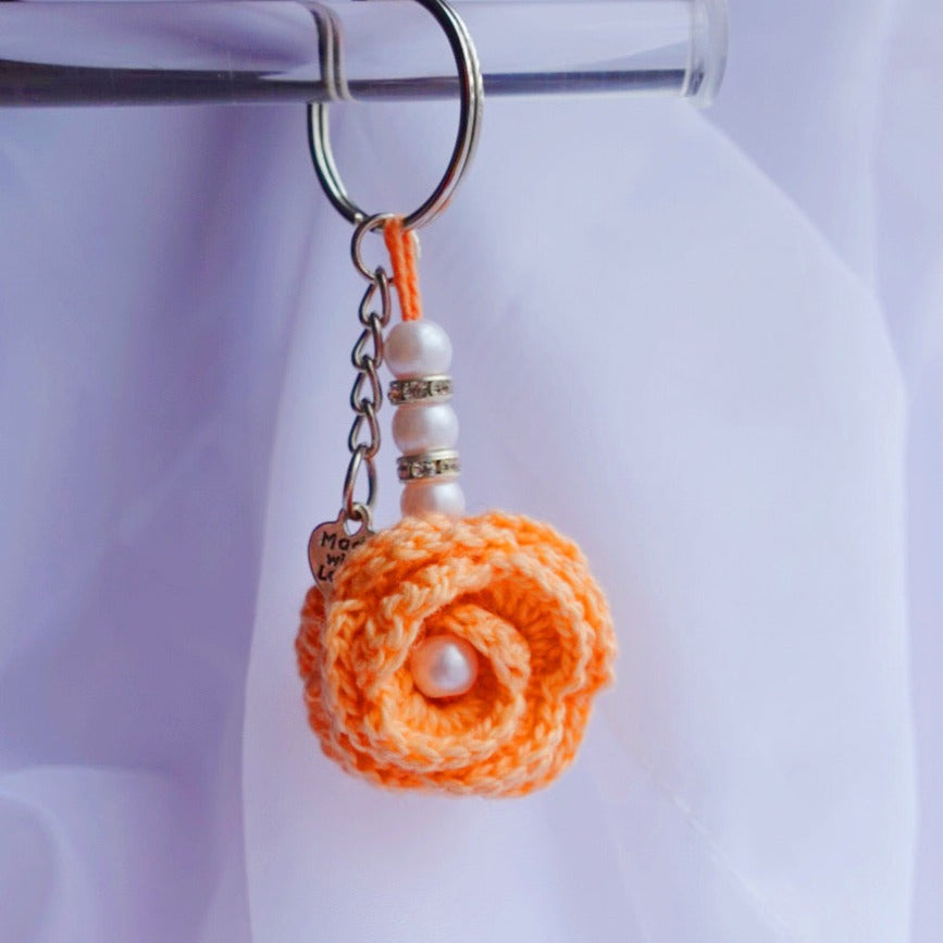 handmade mini crochet flower keychains cute accessories gift ideas eternal flowers handmade sincerely herrera pink yellow blue orange roses coral baby blue purple flower keychains handmade in chicago il