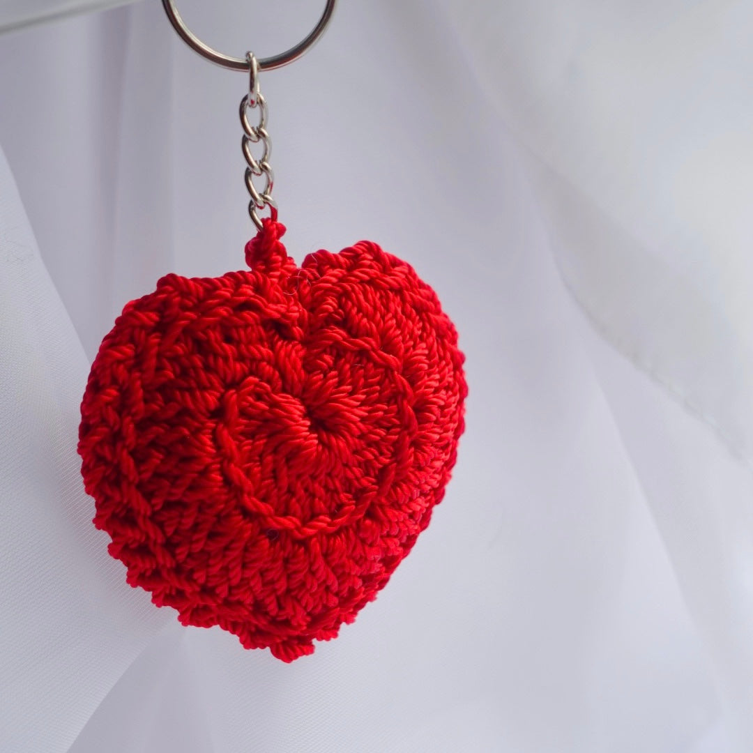 crochet heart keychains pink white ivory red crochet accessories handmade sincerely herrera located in chicago IL cute accessories for bags and keys cute gift ideas valentines day accessories pearl hearts crochet pattern