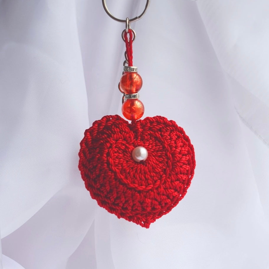 crochet heart keychains pink white ivory red crochet accessories handmade sincerely herrera located in chicago IL cute accessories for bags and keys cute gift ideas valentines day accessories pearl hearts crochet pattern